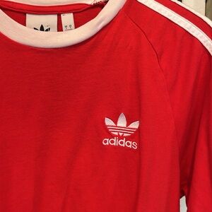 NWOT men’s adidas red ringer tee size small. Three stripes shoulder 100% cotton